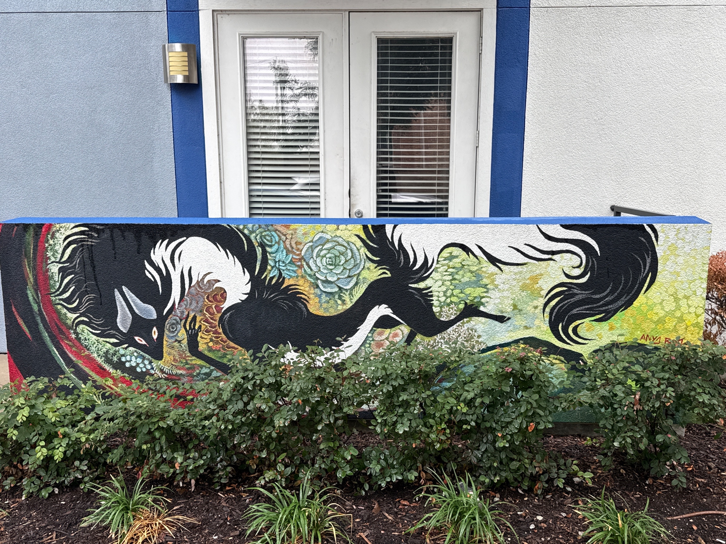 Car at Magnolia Avenue murals